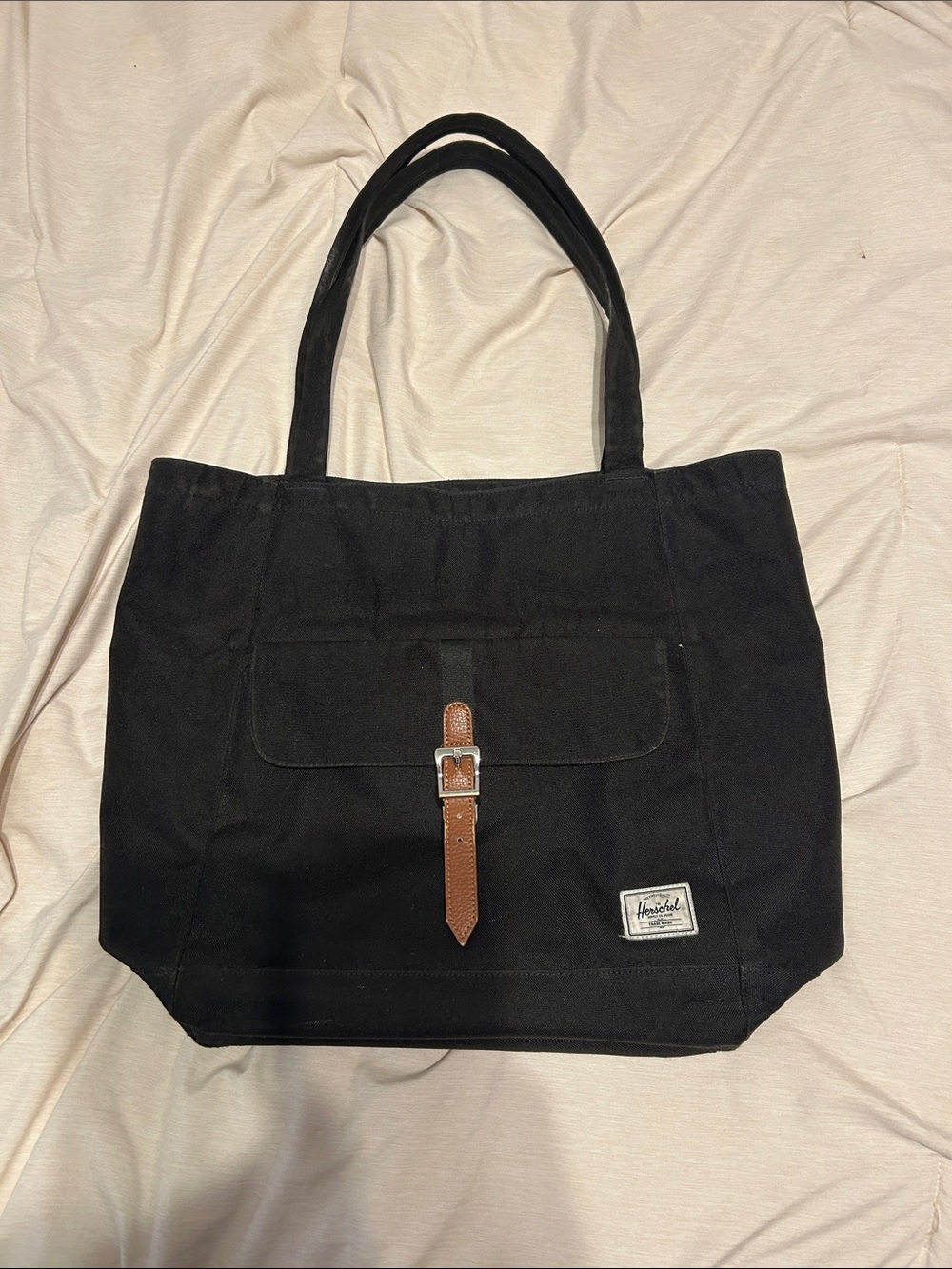 Herschel Black Canvas Tote with Brown Buckle Accent Front Pocket